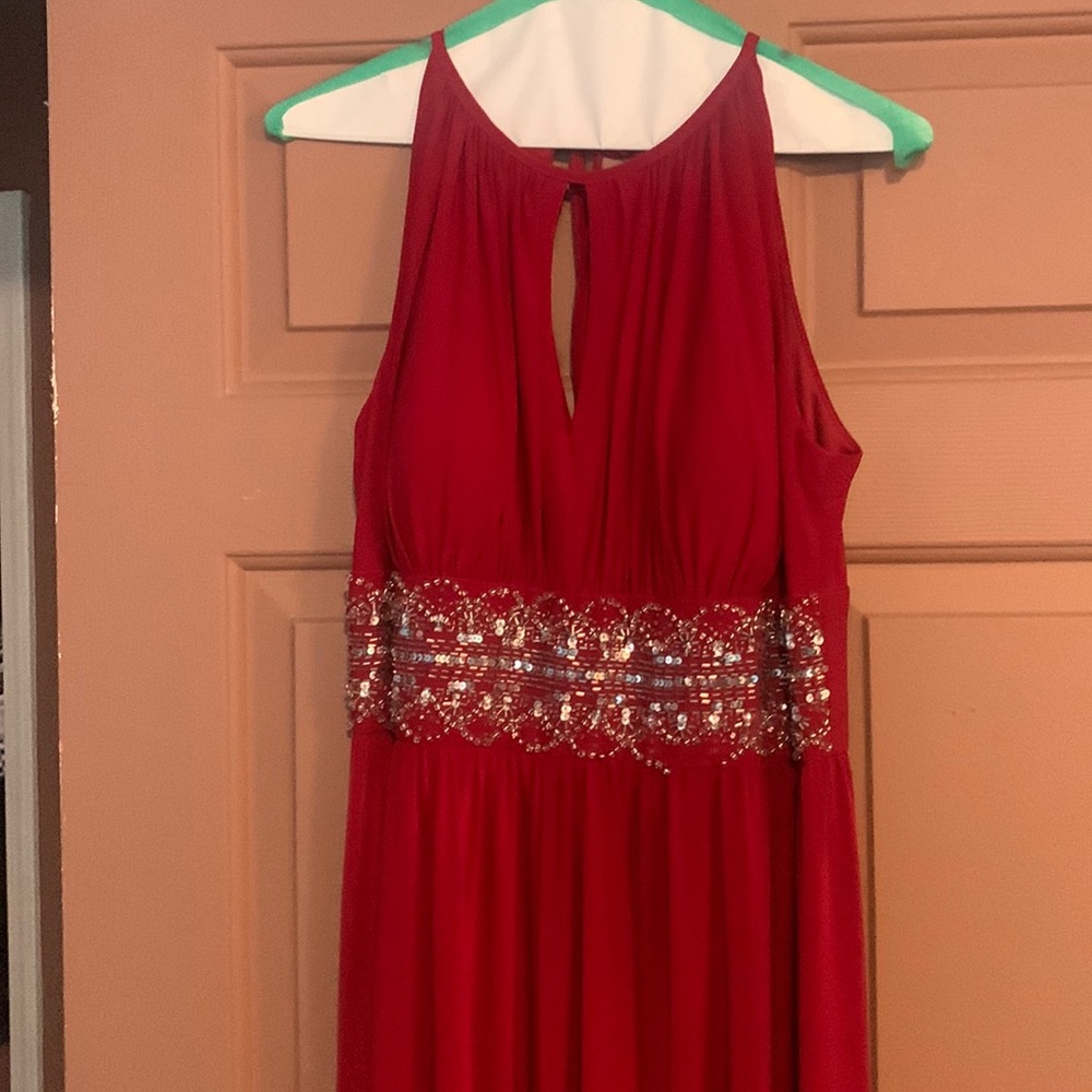 Red sleeveless dress with jewels